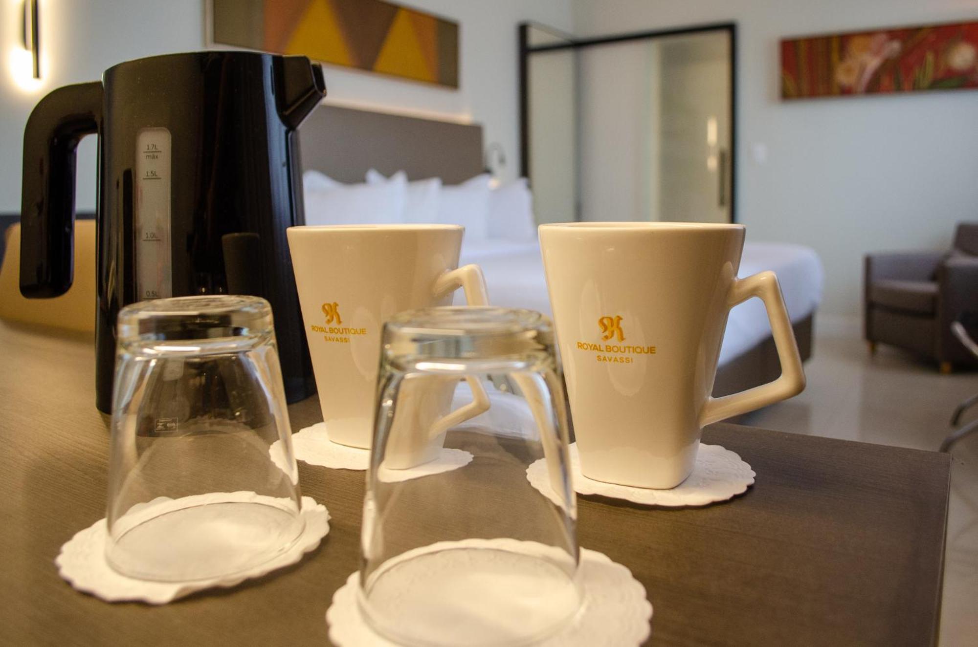 Royal Boutique Savassi Hotel Μπέλο Οριζόντε Εξωτερικό φωτογραφία A coffee pot and two cups